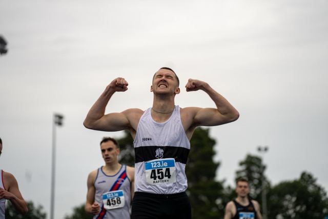 Runner charging down the back straight